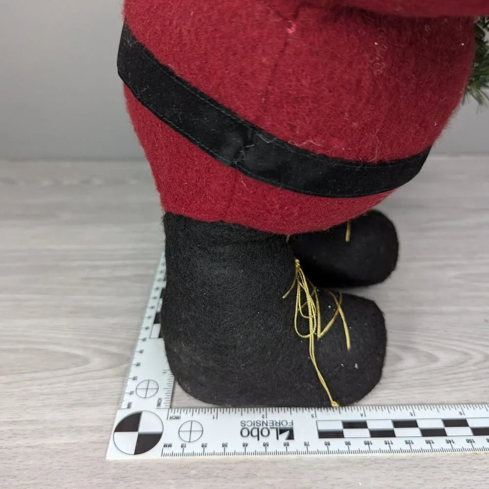 Good Health Ind Free Standing Plush Santa Claus w/ Festive Evergreen Garland